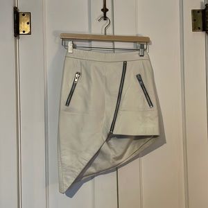 White leather asymmetrical mini skirt